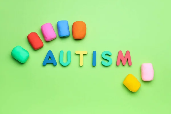 Word Autism Plasticine Green Background — Stock Photo, Image