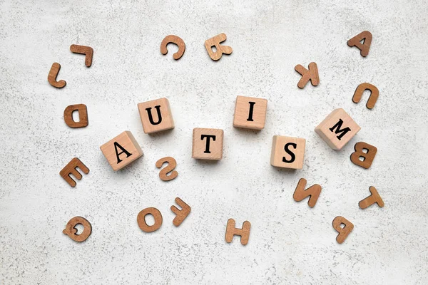 Wooden Cubes Word Autism Letters Light Background — Stock Photo, Image