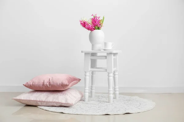 Vase Hyacinth Flowers Cup Stool Pillows White Wall Room — Stock Photo, Image