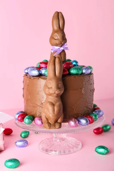Tasty Easter Cake Decorated Chocolate Bunnies Eggs Pink Background — Stock Photo, Image