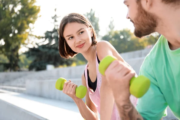 Sporty Young Woman Her Husband Training Dumbbells Outdoors Closeup — Stock Photo, Image