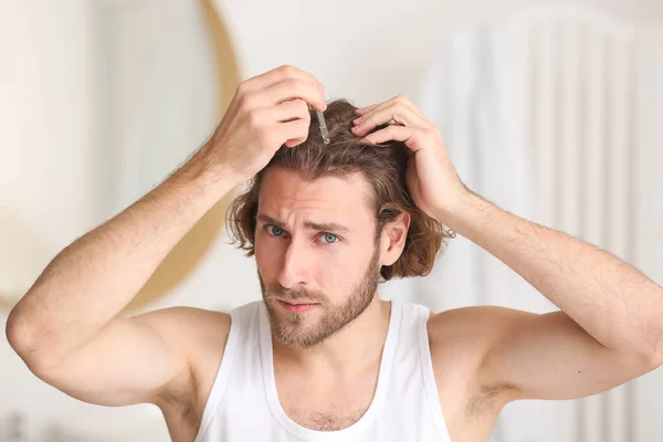 Young Man Using Serum Hair Growth Bathroom — Stock Photo, Image