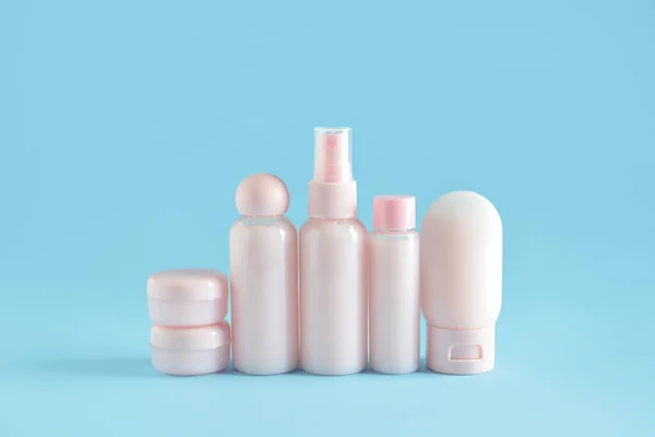 Travel Bottles Jars Cosmetic Products Blue Background — Stock Photo, Image