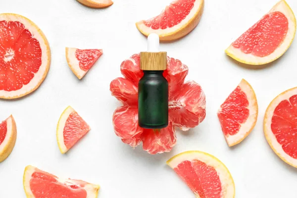 Bottle Grapefruit Oil Light Background — Stock Photo, Image