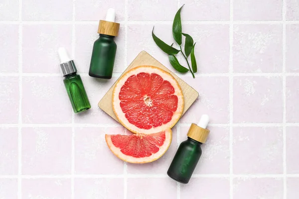 Bottles Grapefruit Oil Color Background — Stock Photo, Image