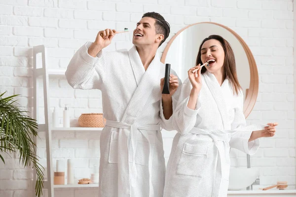 Young Couple Having Fun While Brushing Teeth Activated Charcoal Tooth — Stock Photo, Image