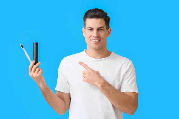 Handsome Young Man Activated Charcoal Tooth Paste Brush Blue Background — Stock Photo, Image