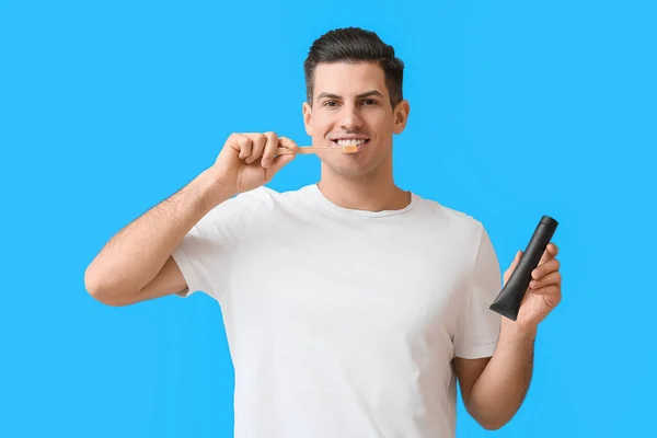 Handsome Young Man Brushing Teeth Activated Charcoal Tooth Paste Blue — Stock Photo, Image