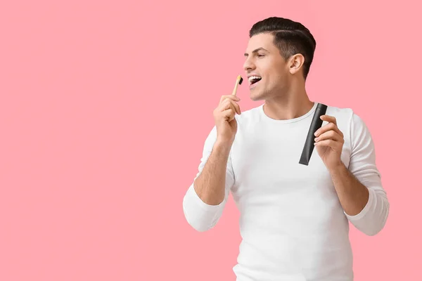 Handsome Young Man Activated Charcoal Tooth Paste Brush Pink Background — Stock Photo, Image