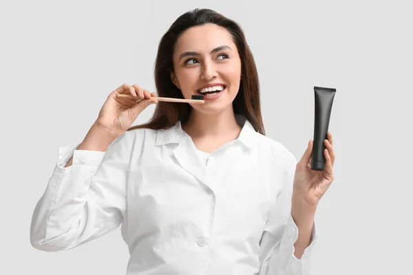 Beautiful Young Woman Activated Charcoal Tooth Paste Brush Light Background — Stock Photo, Image