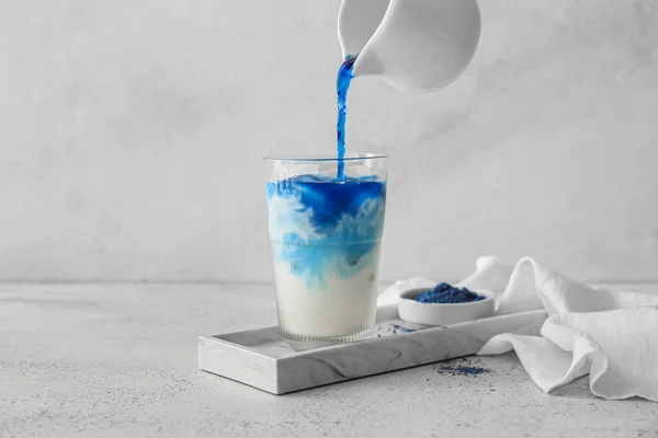 Pouring Blue Matcha Tea Glass Milk Light Background — Stock Photo, Image
