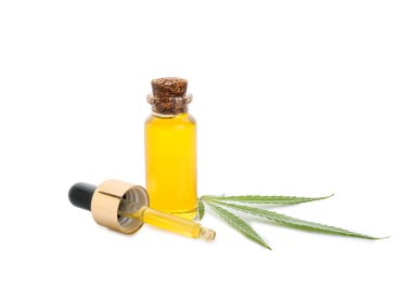Beyaz arka planda bir şişe CBD yağı
