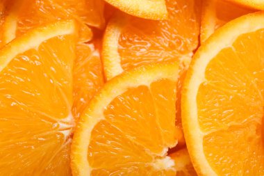 Arkaplan olarak olgun portakal dilimleri, yakın plan