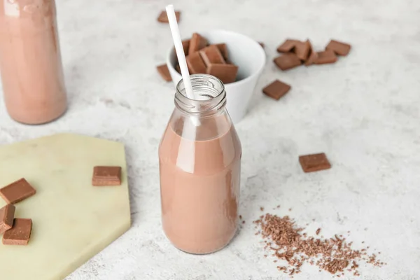 おいしいチョコレートミルクボトルのグランジの背景 — ストック写真