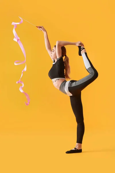 Beautiful Young Woman Doing Gymnastics Ribbon Color Background — Stock Photo, Image