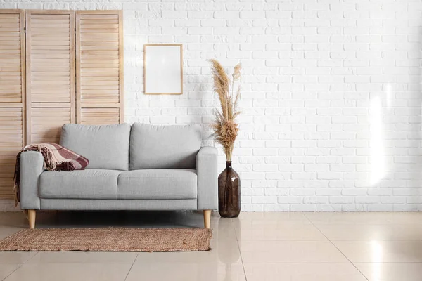 Stylish Sofa Vase Dry Reeds White Brick Wall — Stock Photo, Image
