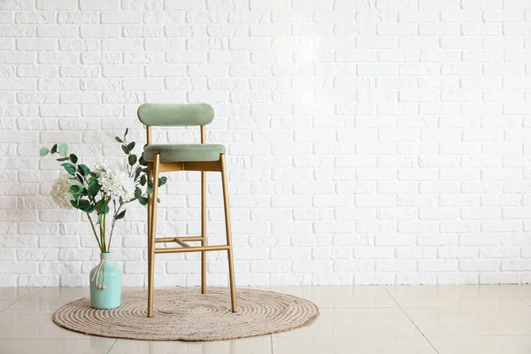 Stylish Chair Vase Flowers White Brick Wall — Stock Photo, Image