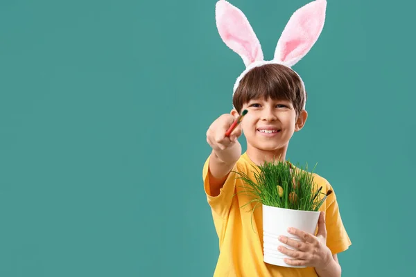 Cute Little Boy Bunny Ears Holding Houseplant Easter Eggs Brushes — Stock Photo, Image