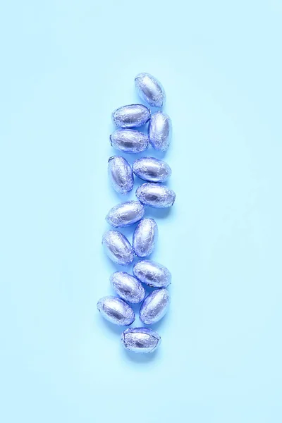 Many Chocolate Eggs Blue Background — Stock Photo, Image