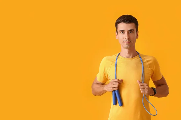 Sporty Young Man Jumping Rope Color Background — Stockfoto