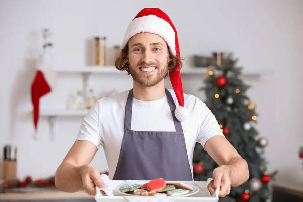 Young Man Santa Hat Holding Tray Christmas Cookies Home — Stock Photo, Image