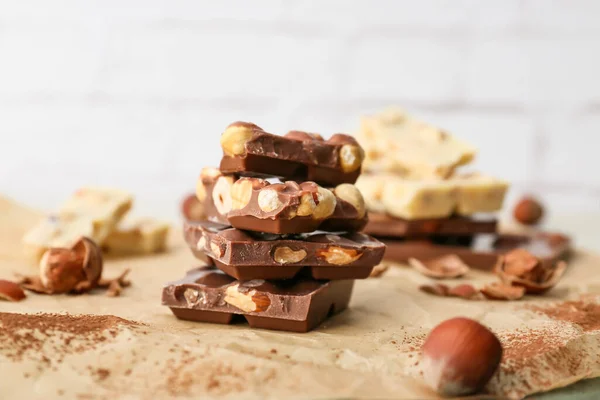 Pieces Tasty Chocolate Nuts Table — Stock Photo, Image