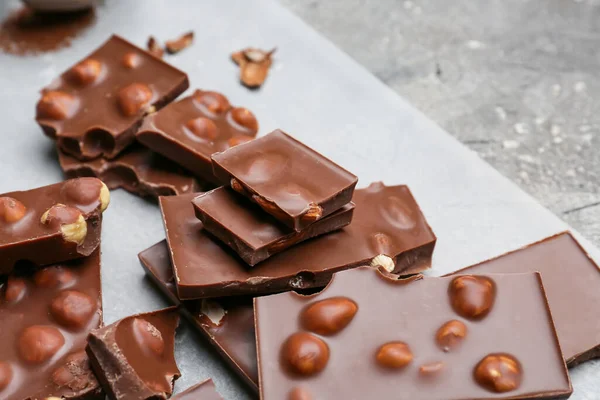 Pieces Tasty Chocolate Nuts Table — Stock Photo, Image