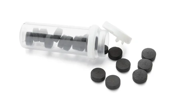 Palack Aktív Szén Tabletták Fehér Alapon — Stock Fotó