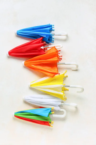 Different Umbrellas Light Background — Stock Photo, Image