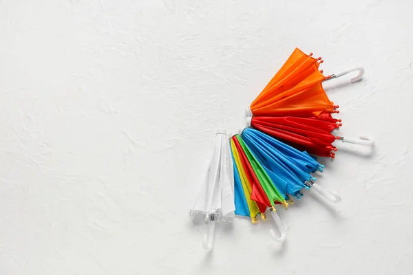 Set Colorful Mini Umbrellas Light Background — Stock Photo, Image