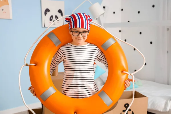 Funny Little Boy Playing Cardboard Ship Lifebuoy Home — Stock Photo, Image