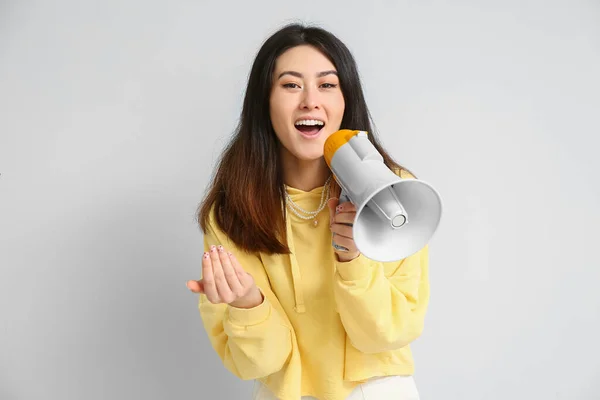 Young Asian Woman Megaphone Inviting Viewer Light Background — Stock Photo, Image