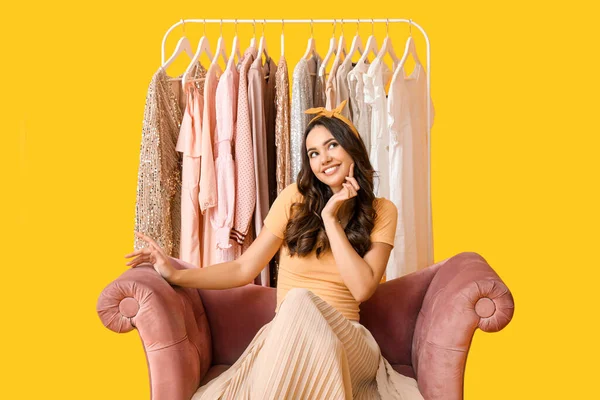 Beautiful Young Girl Sitting Sofa Rack Clothes High School Prom — Stock Photo, Image