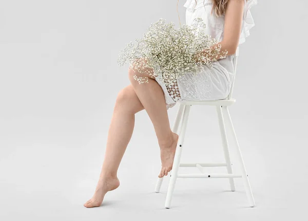 Pretty Young Woman Bouquet Flowers Sitting Chair Light Background — Stock Photo, Image