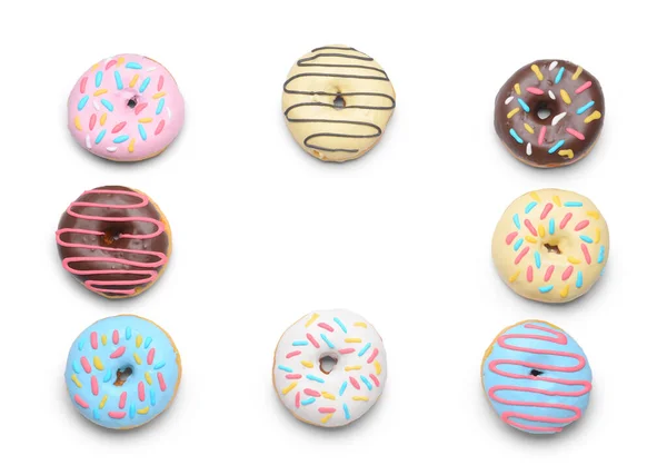 Quadro Feito Deliciosos Donuts Fundo Branco — Fotografia de Stock