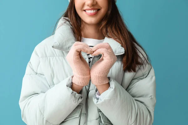 Young Woman Making Heart Shape Her Hands Warm Gloves Blue — Stock Photo, Image