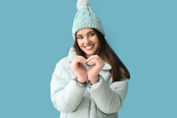 Young Woman Making Heart Shape Her Hands Warm Gloves Blue — Stock Photo, Image