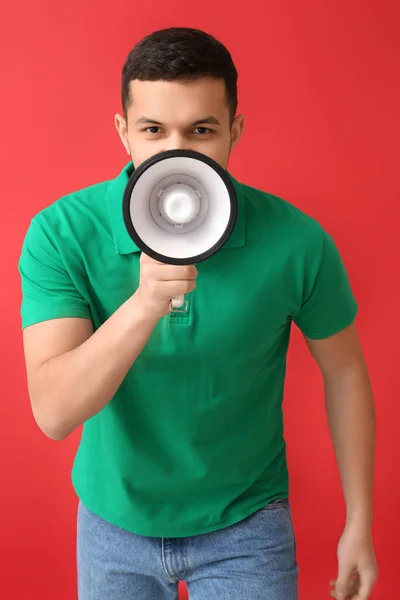 Young Man Shouting Megaphone Red Background — Stock Photo, Image