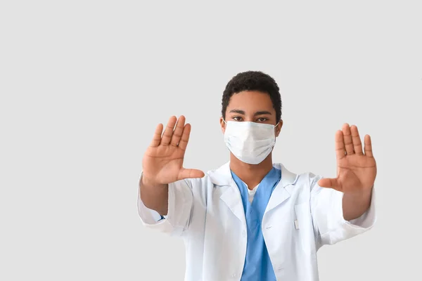 Young African American Doctor Showing Stop Gesture Light Background Immunity — Stock Photo, Image