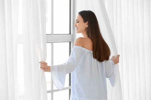 Pretty Young Woman Opening Curtains Room — Stock Photo, Image