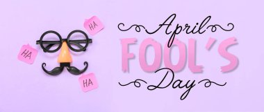 Parti dekoru ve renkli arka planda HA sözcüğüyle yapışkan notlar. 1 Nisan şakası 