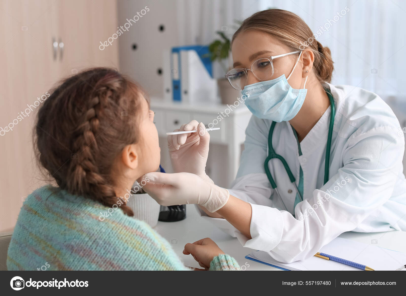 Doctor Examining Little Girl's Throat Clinic Stock Photo by ©serezniy ...