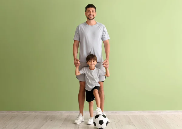 Little Boy Soccer Ball Trainer Green Wall — Foto Stock