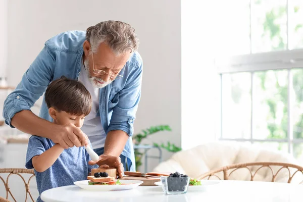 Little Boy Cooking His Grandfather Table Kitchen — Stock Photo, Image