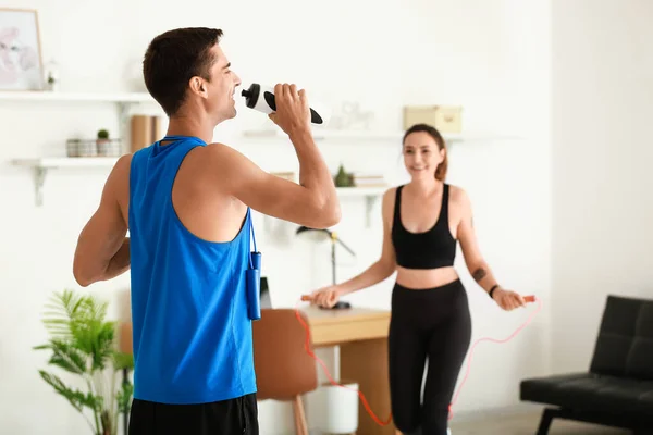 Sporty Young Couple Training Home — Stock Photo, Image