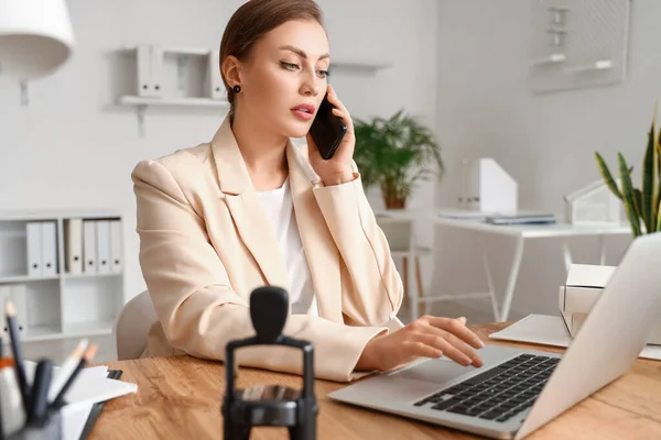 Female Notary Public Talking Phone While Working Laptop Office — Stock Photo, Image