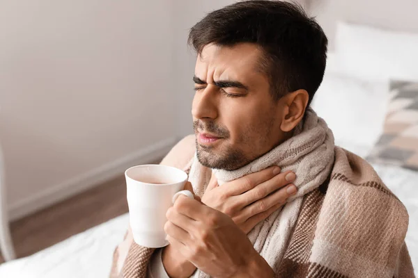 Ill Young Man Sore Throat Drinking Hot Tea Home — Stock Photo, Image