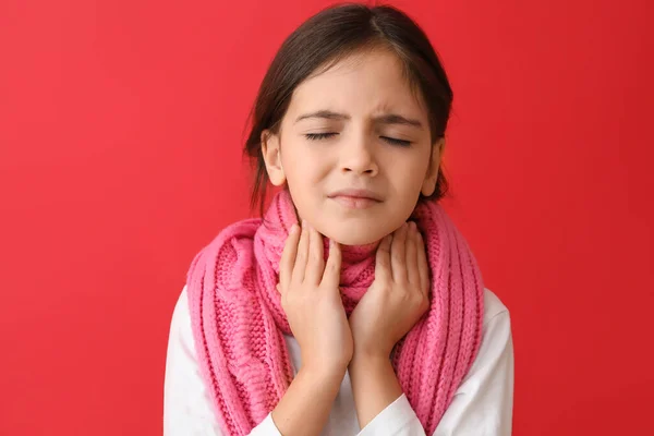 Little Girl Scarf Suffering Sore Throat Red Background — Stock Photo, Image