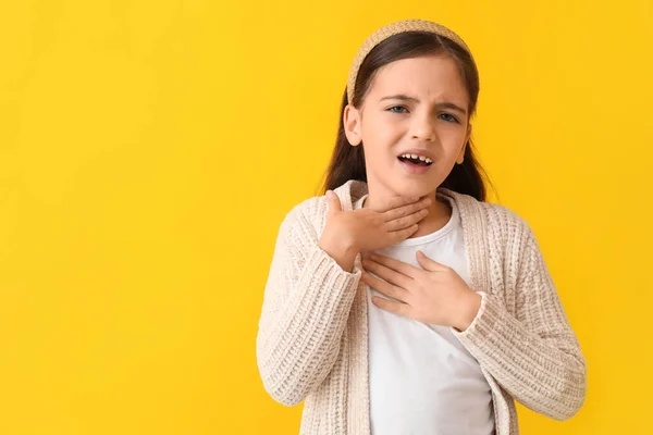 Little Girl Suffering Sore Throat Yellow Background — Stock Photo, Image