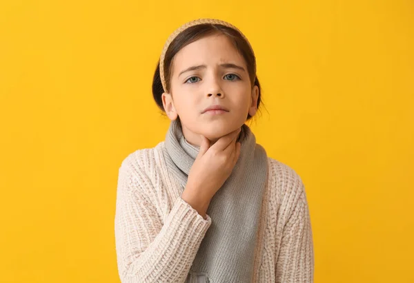 Sad Little Girl Suffering Sore Throat Yellow Background — Stock Photo, Image